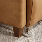 Fauteuil Art Leon en cuir avec design matelassé pour un confort intemporel