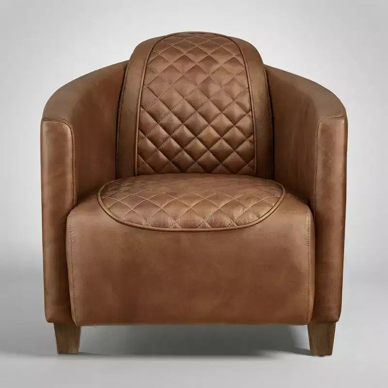 Fauteuil Art Leon en cuir avec design matelassé pour un confort intemporel