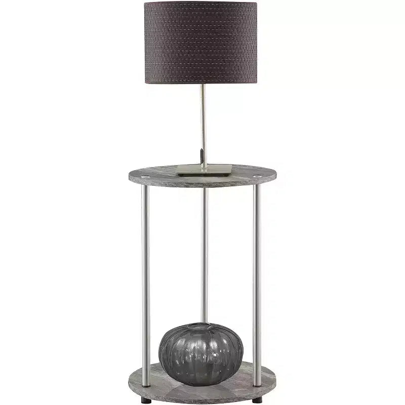 Table d'appoint ronde à deux niveaux HomeStock Belmont avec pieds en acier inoxydable, étagères robustes en panneaux de particules et style moderne contemporain.