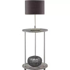 Table d'appoint ronde à deux niveaux HomeStock Belmont avec pieds en acier inoxydable, étagères robustes en panneaux de particules et style moderne contemporain.