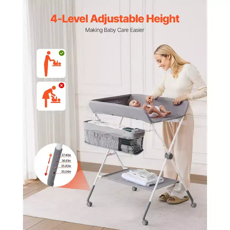 Table à langer VEVOR, Station à langer pliable avec panier latéral, Roues verrouillables, Organisateur de rangement multifonctionnel pour chambre d'enfant, Gris clair