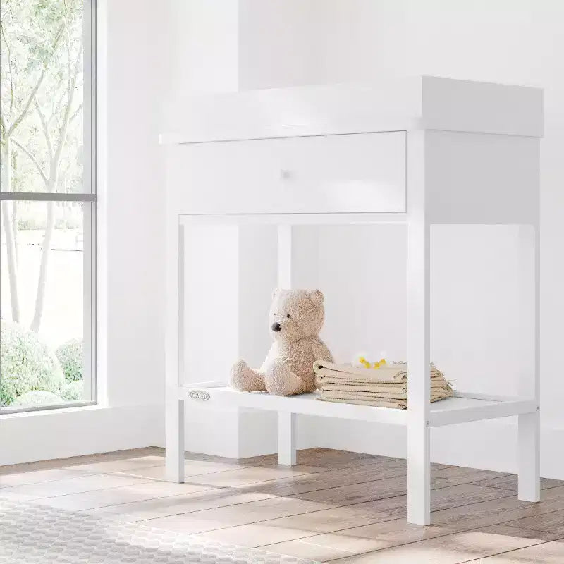 Table à langer Graco avec rangement