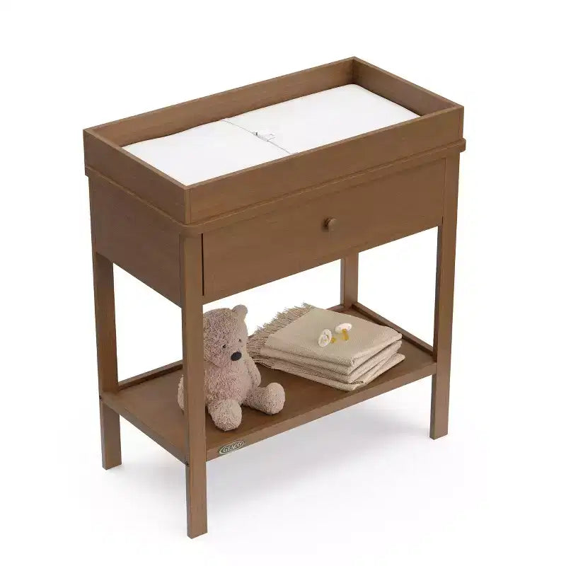 Table à langer Graco avec rangement