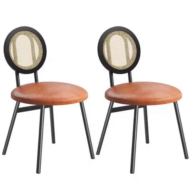 Modern upholstered dining chairs  Contemporary set with natural rattan backrest, metal legs  Space-saving design for dining room