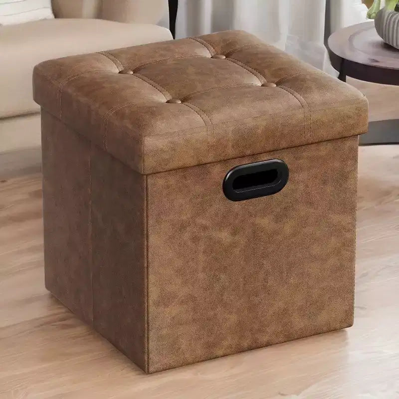 SONGMICS Pouf de rangement pliable de 38 cm, Repose-pieds cubique, Table basse avec poignées à trous, Similicuir