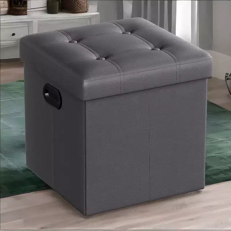 SONGMICS Pouf de rangement pliable de 38 cm, Repose-pieds cubique, Table basse avec poignées à trous, Similicuir