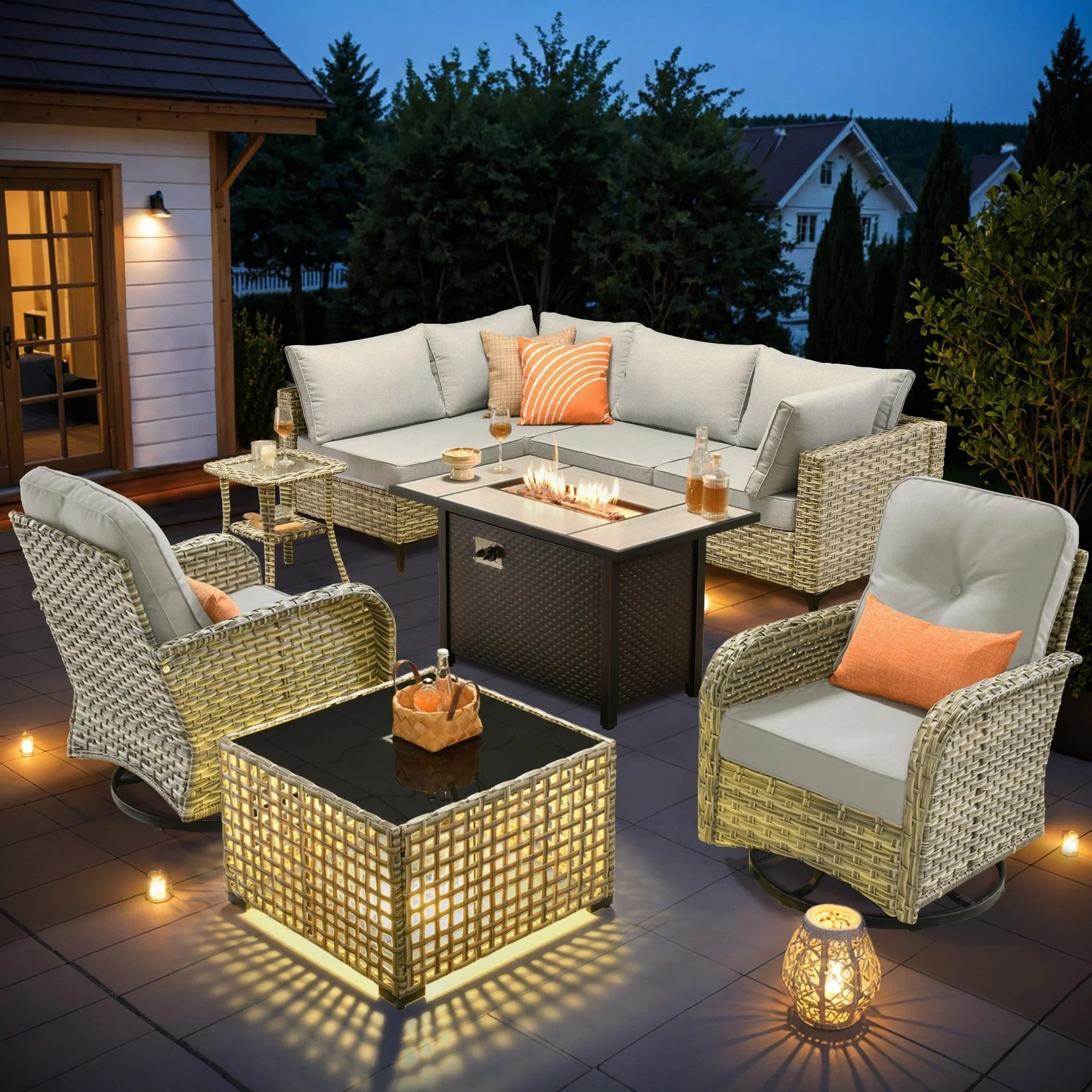 Ensemble de 9 chaises pivotantes en osier d'extérieur OVIOS avec table brasero